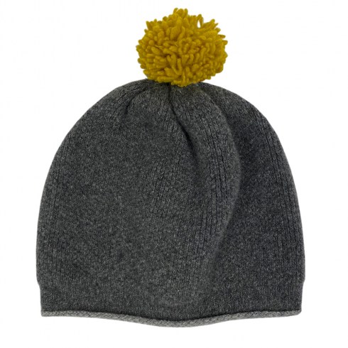grey pom pom hat with light grey trime and piccalilli pom